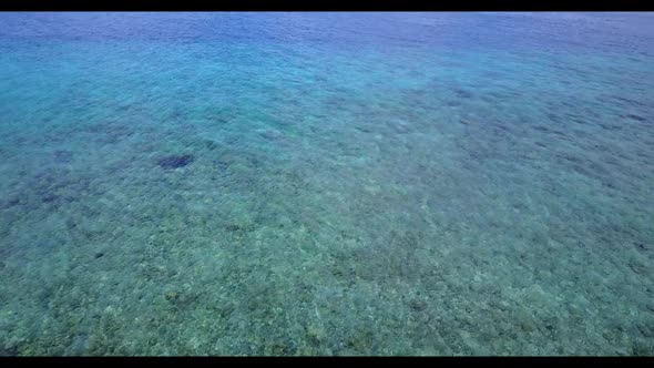 Aerial nature of marine shore beach holiday by turquoise ocean and white sandy background of a dayou