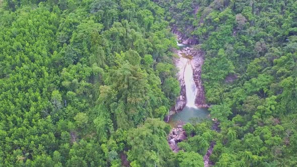 Aerial View River Cascade Waterfalls Among Green Hills