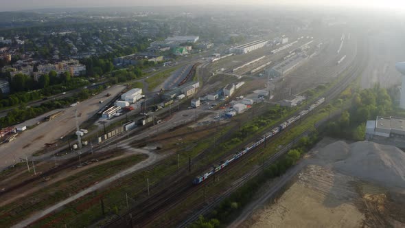 Aerial view. Modern high speed train. Railroad in landscape, aerial view from above. 