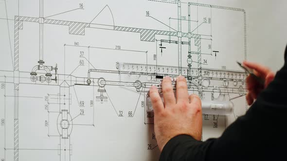 Architect Designer Working with Plan Blueprint Closeup