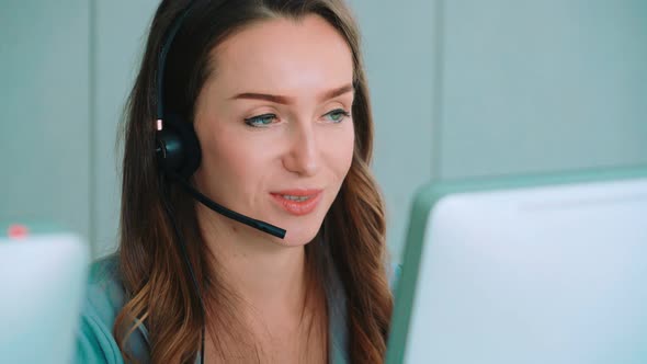 Business People Wearing Headset Working in Office