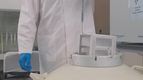 Laboratory Samples are Taken From a Liquid Nitrogen Fridge