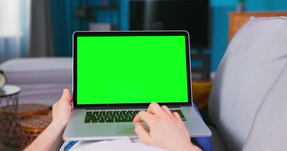 Close Up of Male Hand is Using Laptop Touch Pad