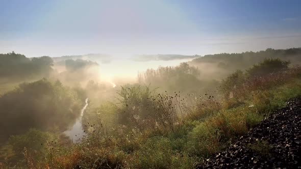 Beautiful sunrise over valley with beautiful mist in autumn, Poland, Europe