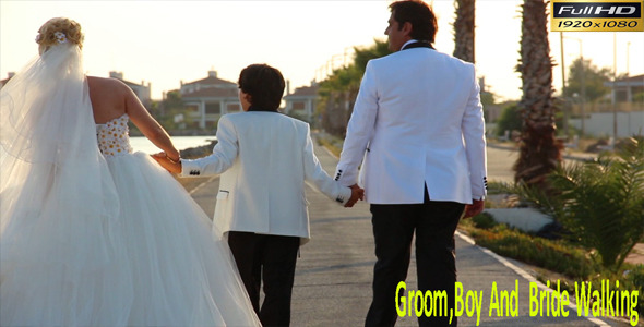 Groom,Boy And  Bride Walking 