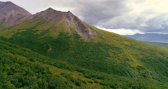 Stunning Aerial View of a Beautiful Mountain Ridge a Ravine at the Foot of It