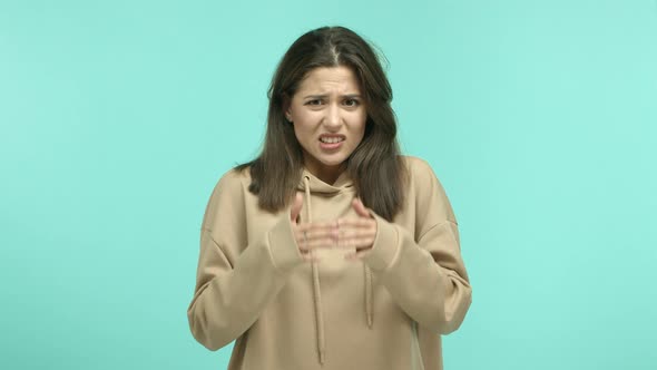 Young Caucasian Woman Feeling Embarrassed Covering Eyes and Grimacing Feeling Uncomfortable to Look