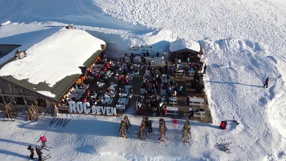 Majestic Winter Aerial Landscape and Ski Resort with Typical Alpine Wooden Houses in French Alps