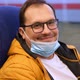 Happy Millennial Man Rides Train and Smiles at the Camera After Lowering a Medical Mask on His Chin - VideoHive Item for Sale