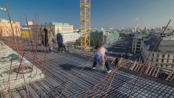 Construction Workers Working on Steel Rods Used to Reinforce Concrete Timelapse