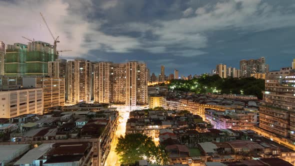 Night to day time lapse of Macau residential area, wide angle