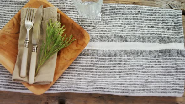 Various cutlery on wooden table 4k