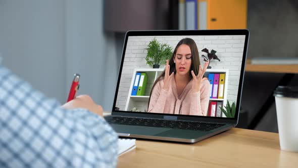 Man Doctor Psychotherapist at Office Listen Patient Online Video Call Laptop