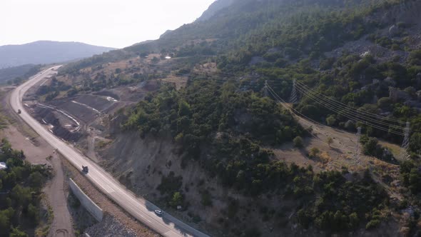 Aerial Drone View of Mountain Highway on a Summer Day