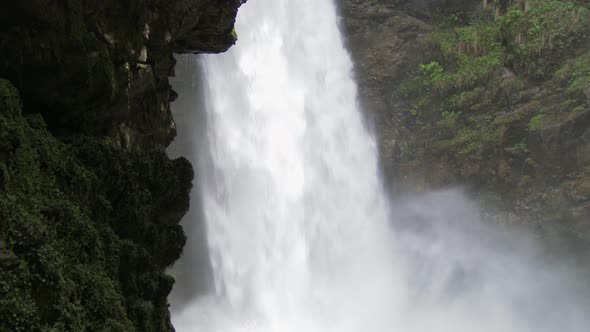 Water Vapors in Waterfall Pool Going to Mossy Rocks