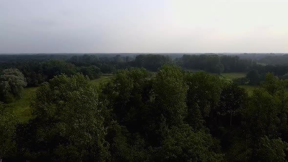 A drone flight over the Kempen forest and village in Belgium near to Antwerp. A drone flight over a