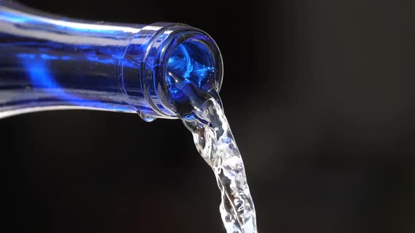 Water Pouring From a glass Bottle