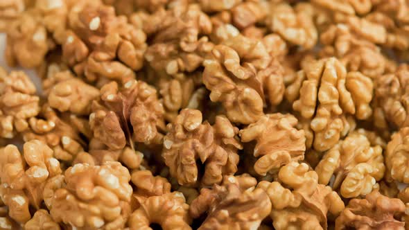 Looped Spinning Walnuts Without the Shell Closeup Full Frame Background