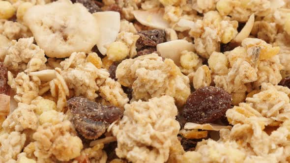 Crunchy tasty muesli food background close-up slow tilt 4K 3840X2160 UltraHD footage - Cereals and d