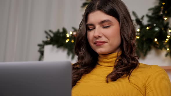 Close Up Smiling Young Woman Uses Laptop Online Chatting Christmas Holidays