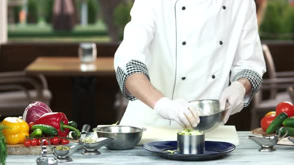 Male Chef Preparing Salad.