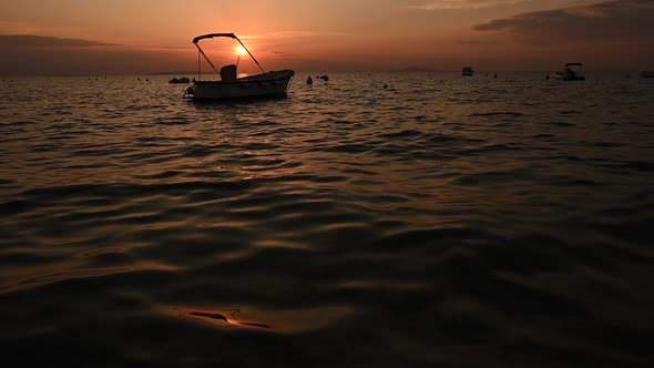 Small Boats in the Marina During Sunset