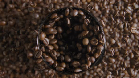 Process Grinding Coffee Grains Close Up