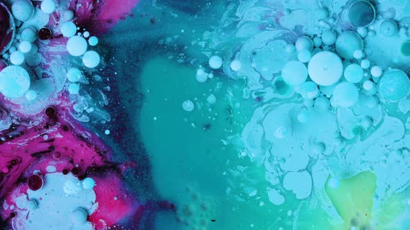 Visual Fluid Art Acrylic Paint Spread Blast Explode Galaxy. Bright colored bubbles sparkling.