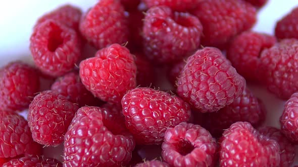 Close-up Rotation. Red Raspberry Spinning on the Table