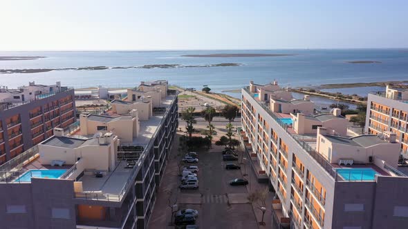 Aerial View of the Urban Area of Portugal in the South of Houses with Modern Infrastructure Swimming