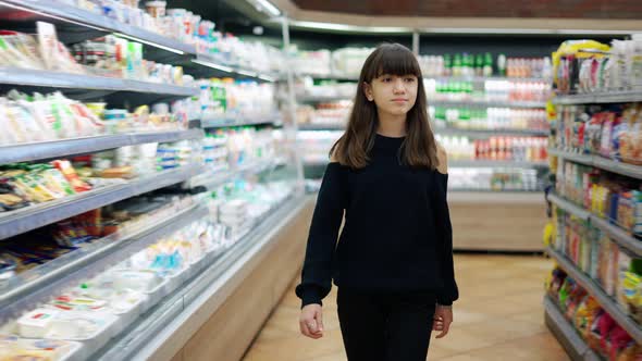 Independent Teenager in the Supermarket