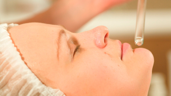Facial Procedure At Beauty Spa With Laser Using