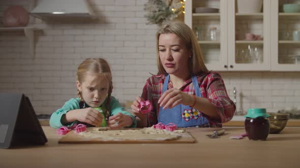 Family Preparing Homemade Cookies in Kitchen