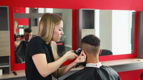 Young Man Customer and Woman Barber