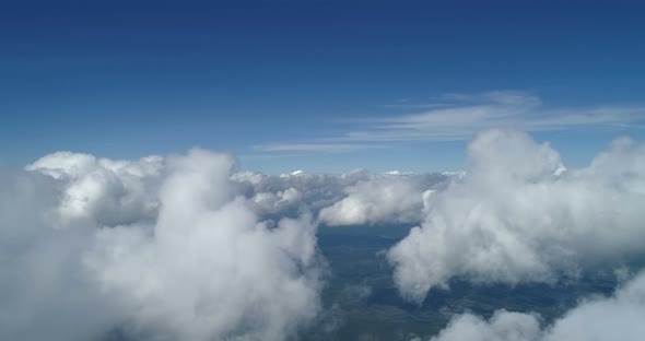 Cockpit View From Airplane Window and Above Clouds, Aerial Footage 