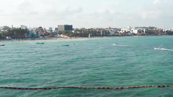 Jet Skis Cruising Towards the Beach at Playa Del Carmen Mexico