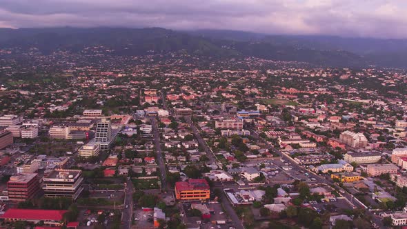 An aerial overview of Kingston, Jamaica. Taken during sunset from above the Pagasus Hotel. Panning f