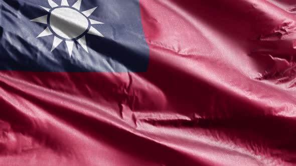 Taiwan textile flag waving on the wind. Slow motion. 20 seconds loop.