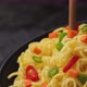Instant noodles with chopsticks on black background, ProRes uncompressed - VideoHive Item for Sale