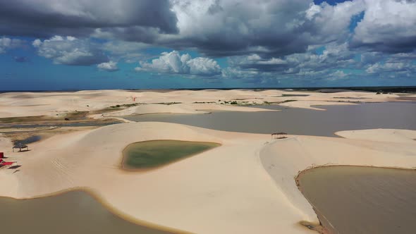 Sand dunes mountains and rain water lagoons at northeast brazilian paradise.