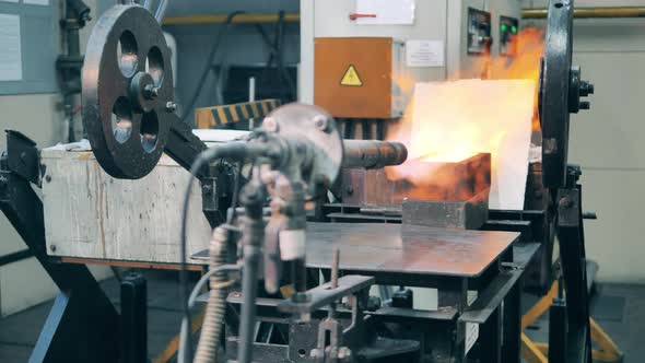 Industrial Burner is Processing a Mold with Gold