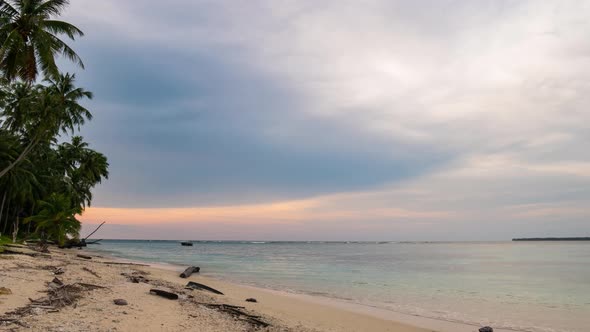 Time lapse: sunset over tropical beach and sea colorful dramatic sky