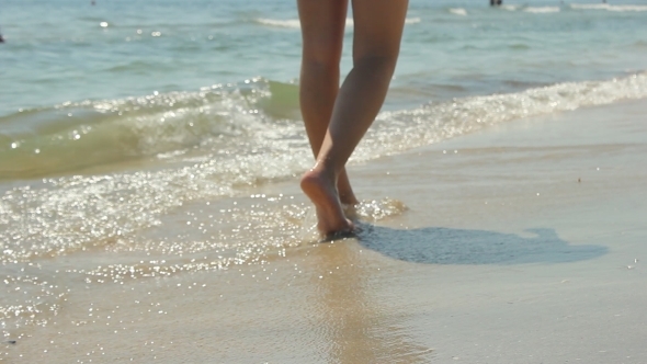 Girl Feet Walking the Beach