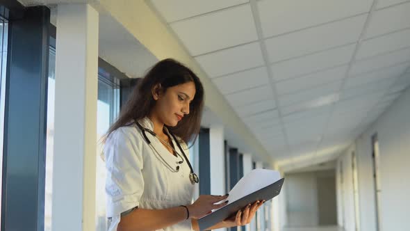 Indian Woman Physician or Nurse Professional General Practitioner Posing with Stethoscope in Medical