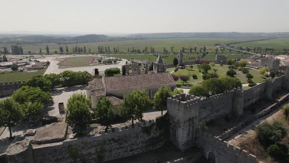 Fortified hilltop castle of Montemor-o-Velho, Coimbra, Portugal; drone