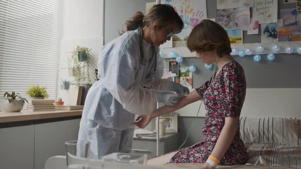 Nurse Putting IV to Patient