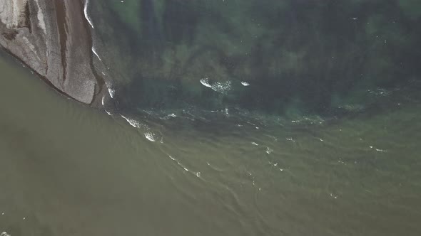 An Aerial View of a Spawning River with Thousands of Coho Salmon Swimming in It