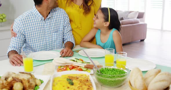 Happy family having lunch together