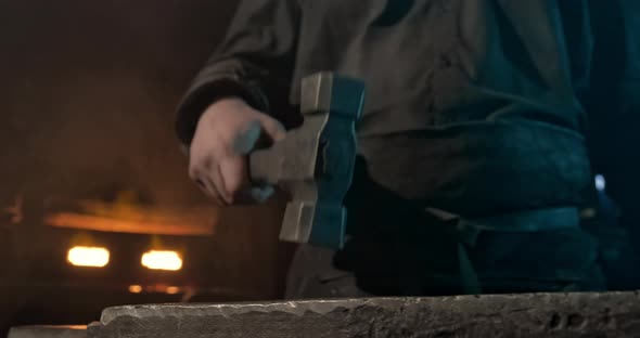 Closeup of a Blacksmith's Hammer on an Anvil