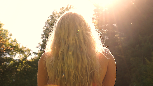 Girl Looking Into Sun 2